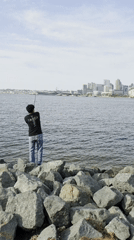 Two anglers fish from rocky Coronado shoreline