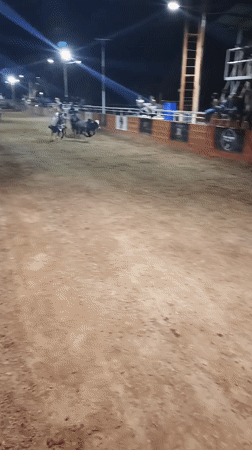 Nighttime rodeo and horse racing event held in Tinaquillo, Venezuela