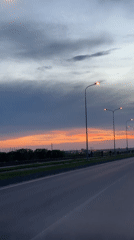 Sunset views captured across Chaikovsky, Russia waterfront and roads