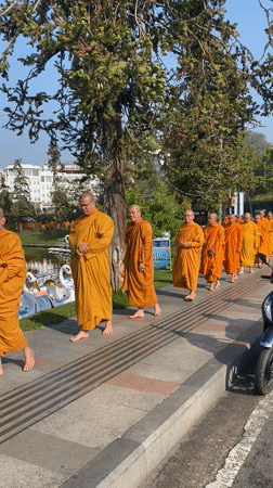 Buddhist monks process through Da Lat tourist area