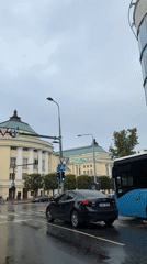 Rainy afternoon traffic and street scenes in central Tallinn