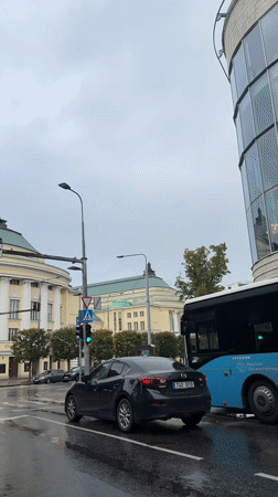 Rainy afternoon traffic and street scenes in central Tallinn