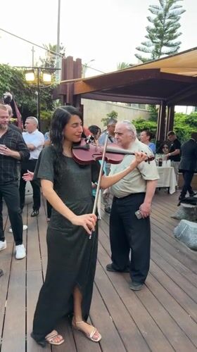 Live music and dancing at a Netanya outdoor evening event