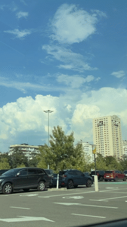 Street-level snapshots from a Kyiv residential area, midday