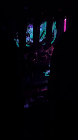 Nightclub scene with DJ, dancers captured in Karlovo, Bulgaria
