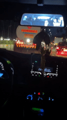 Driver records flammable tanker truck in nighttime Philippines traffic