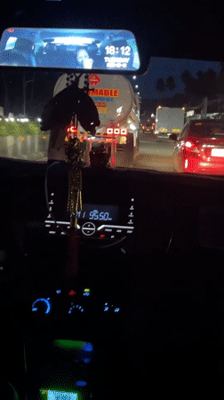 Driver records flammable tanker truck in nighttime Philippines traffic