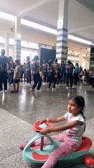 Marching band performs indoors in Camurí Grande, Venezuela