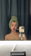 Woman photographed during bathroom routine in Лобаново, Russia