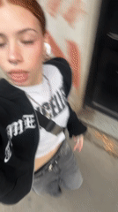 Young Woman Films Selfie Video While Walking in Buenos Aires