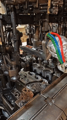 Glass factory machinery operates during morning shift in Pleven