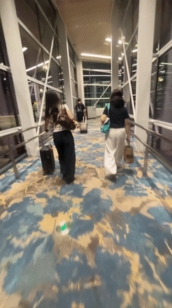 Boarding a Shenzhen Airlines flight at Guangzhou Baiyun at night