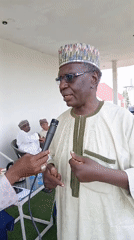 Elderly man interviewed at traditional gathering in Shaba, Nigeria
