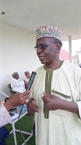 Elderly man interviewed at traditional gathering in Shaba, Nigeria