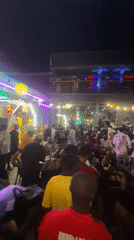 Busy nightlife scene captured at outdoor venue in Lokoja