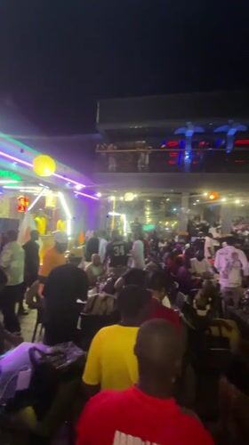 Busy nightlife scene captured at outdoor venue in Lokoja