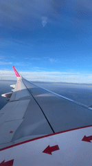 Passenger captures Wizz Air wing view over Dortmund