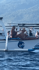 Tourist boat excursion with passengers spotted off Banjar, Indonesia