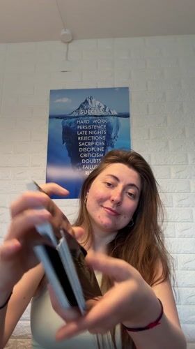 Tarot reader draws Tower card in daily reading session