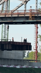 Families, workers gather at Dmitrov bridge during afternoon outing