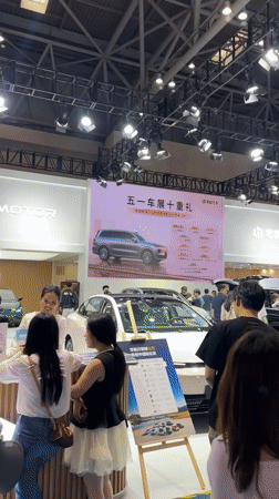 Auto exhibition showcases electric vehicles in Liangjiang, China