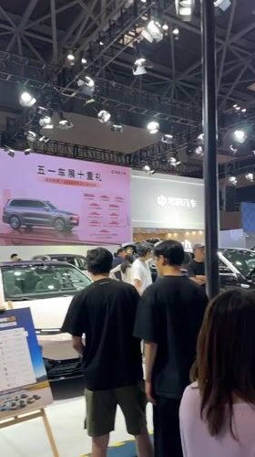 Auto exhibition showcases electric vehicles in Liangjiang, China