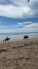 Beach activities captured during morning hours in Kamala, Thailand