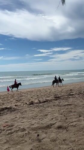 Beach activities captured during morning hours in Kamala, Thailand