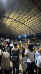 Women's volleyball match draws cheering crowd in Davao gymnasium