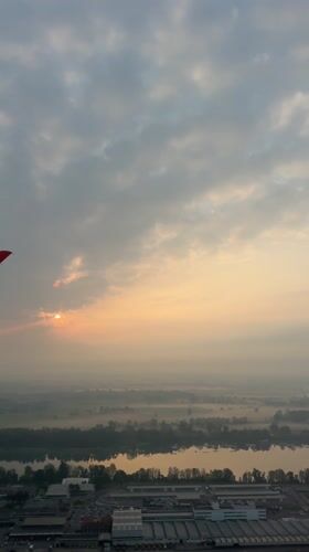 Dawn flight arrival documented in misty Peschiera Borromeo