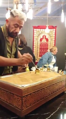 Man demonstrates traditional Turkish coffee preparation in Santiago