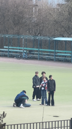Young people gather on sports field in Staraya