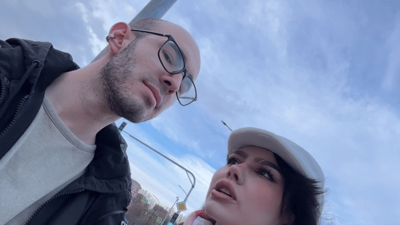 Young girl poses before reflective surface in Khimki