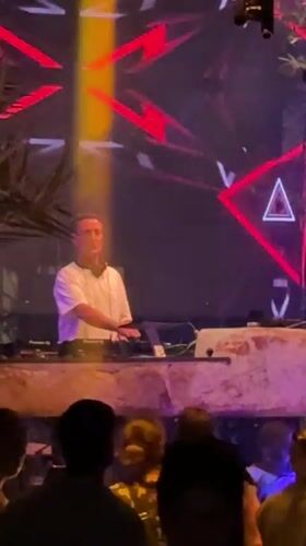 Nightclub party with DJ performance captured in Baan Lamai