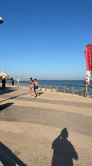 Morning exercise and emergency response on Tel Aviv promenade