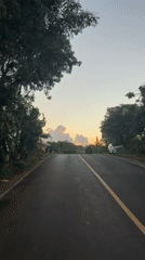 Road scene captured during overcast sunset in Kuta Selatan