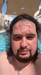 Man records poolside selfie video in Eilat resort area