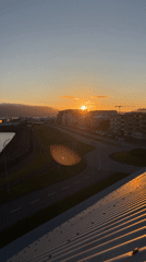 Reykjavik sunset seen from rooftops, streets, and the coast