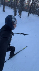 Cross-country skier films winter trail run in Kazan forest