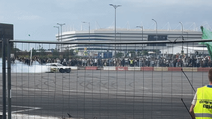 Drift event in Kaliningrad with smoke, crowds, and custom builds
