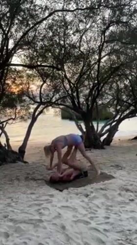 Tourists capture sunset beach moments across Ko Tao island