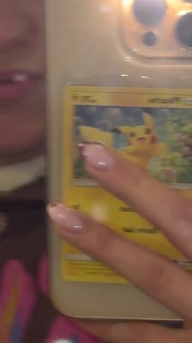 Person unpacks colorful folders with QR code in Milano