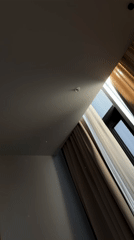 Indoor scenes captured in Tbilisi showing room details, television display