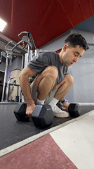 Man attempts dumbbell handstand at Krasnoyarsk gym