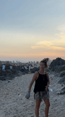 Women clean up beach litter in Mũi Né, Vietnam