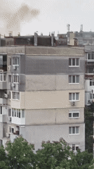 Fire reported in residential area during rainy afternoon