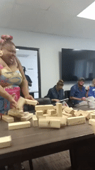 Office Workers Play Jenga Game During Los Angeles Workplace Gathering