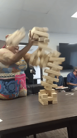 Office Workers Play Jenga Game During Los Angeles Workplace Gathering