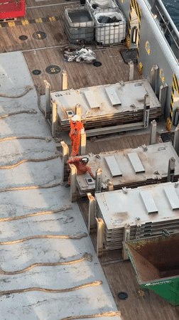 Deck crew and offshore platform activity captured from multiple angles