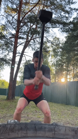 Backyard tire and sledgehammer workout in Krasnoturansk, Russia